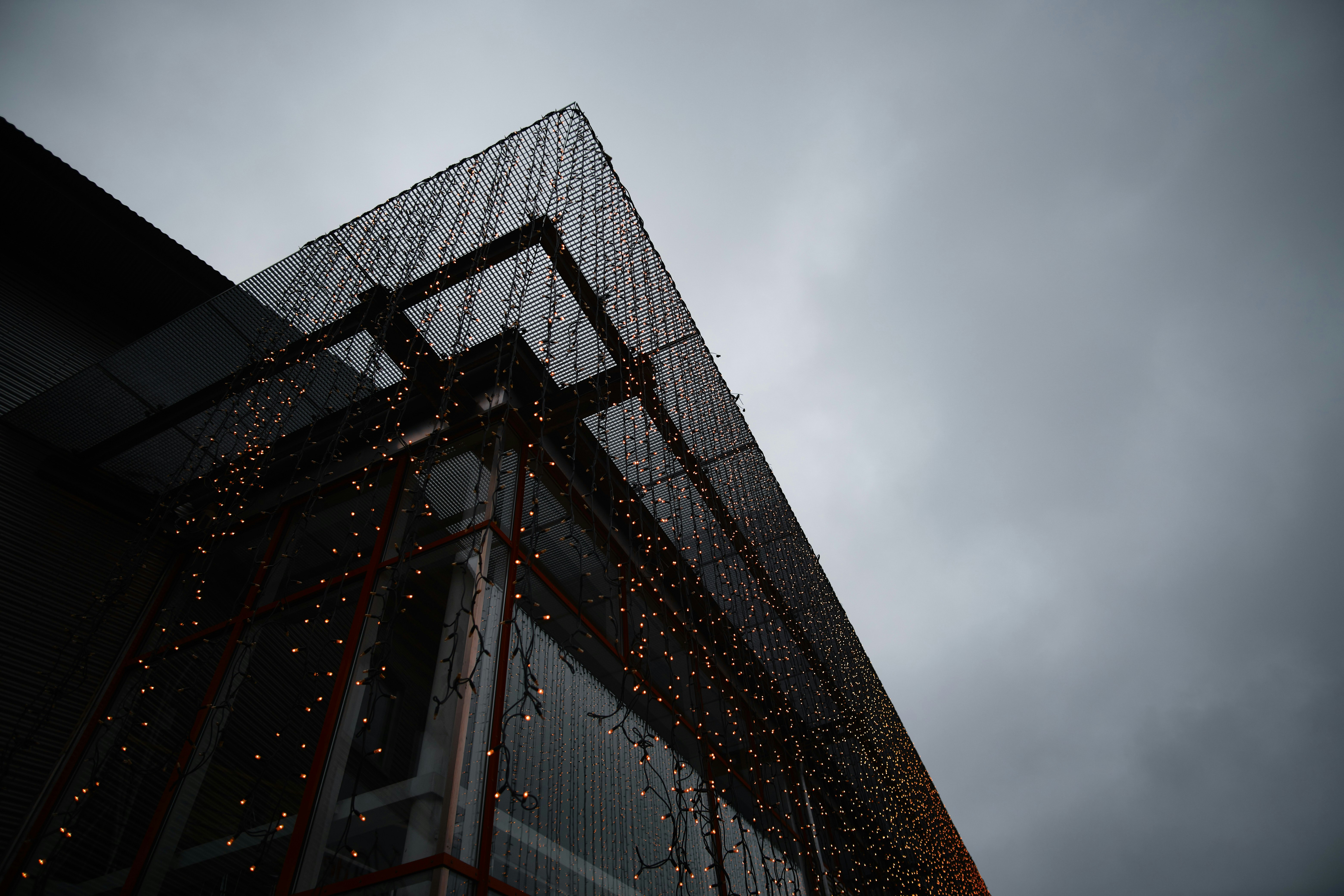 black glass walled high rise building